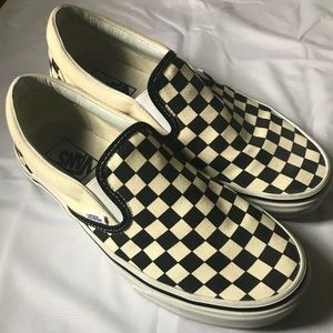 Off white checkered vans.
